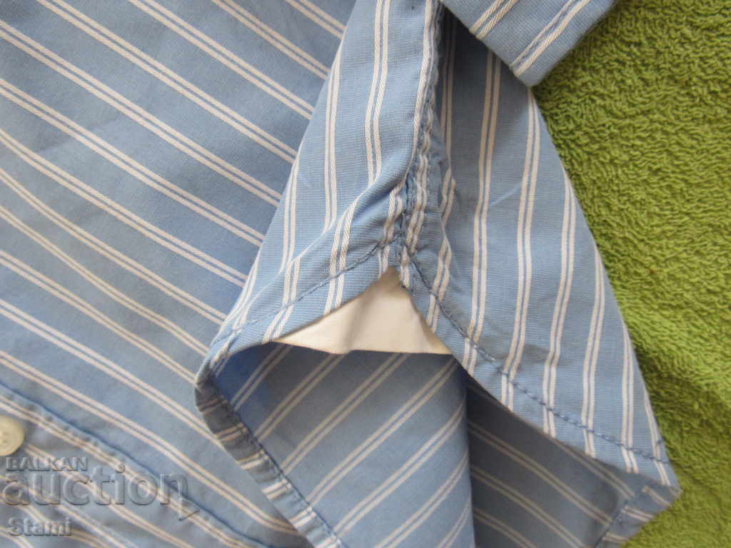 Blue long-sleeved shirt for a boy H&M size 122 - 7 Blue long-sleeved shirt for a boy H&M size 122 - 7