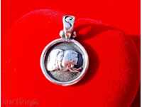 Silver medallion, pendant, zodiac sign.