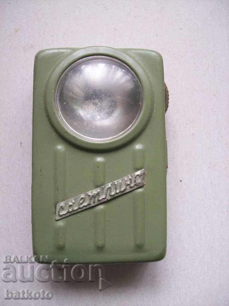 An old military flashlight