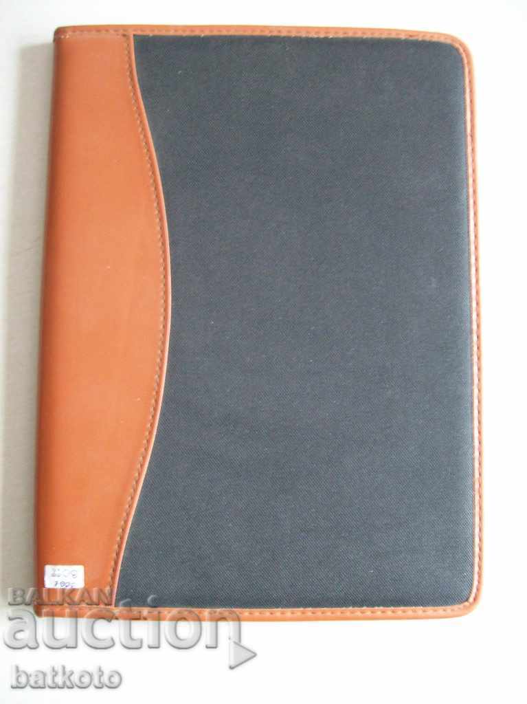 A very nice, big, luxurious folder with a calculator