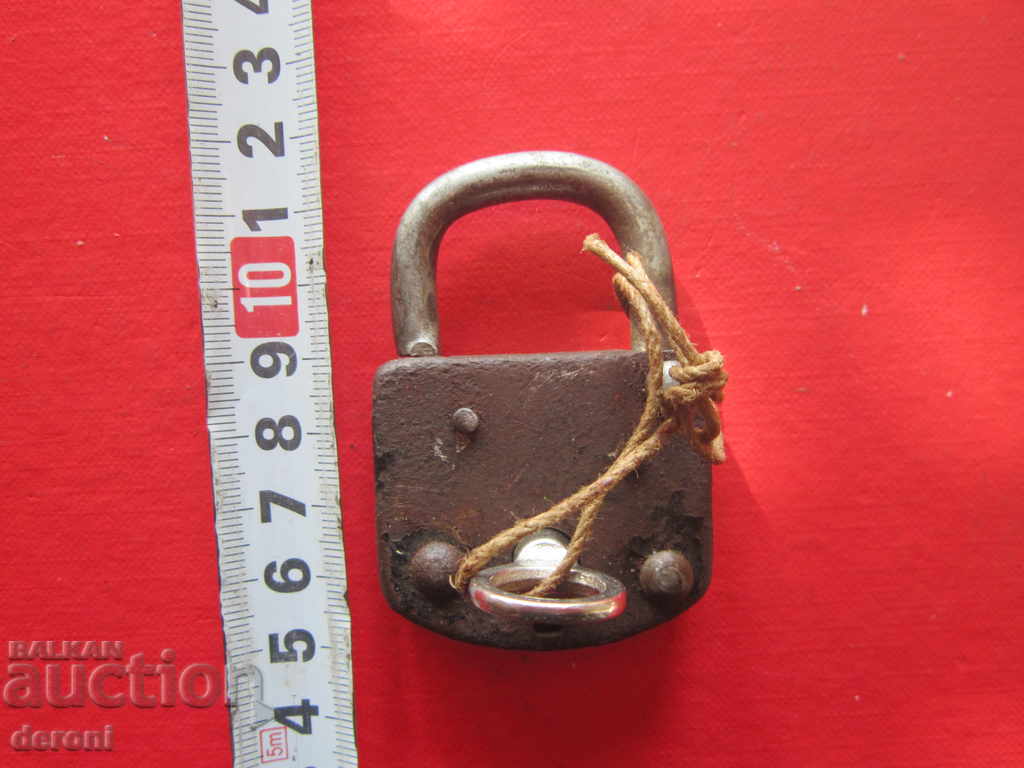 Old German lock padlock with key switch
