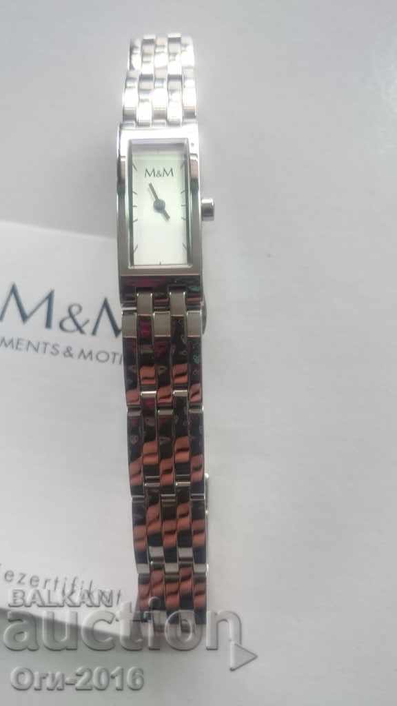 Παράδοση Το ρολόι M & M για κυρίες