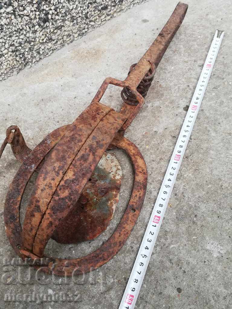 Auction Hand forged trap with wrought iron spikes Auction Hand forged trap with wrought iron spikes