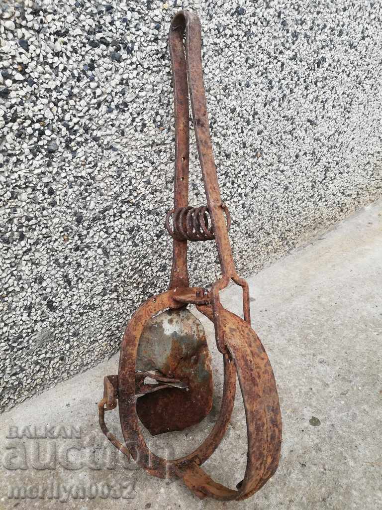 Hand forged trap with wrought iron spikes