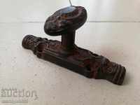 Handle made of embossed cast iron for window grip hardware