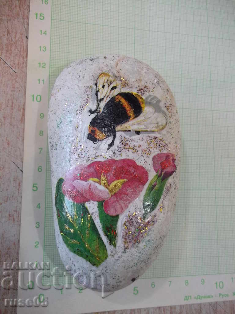 River stone with colored appliqués
