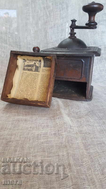 Auction An old coffee grinder Auction An old coffee grinder