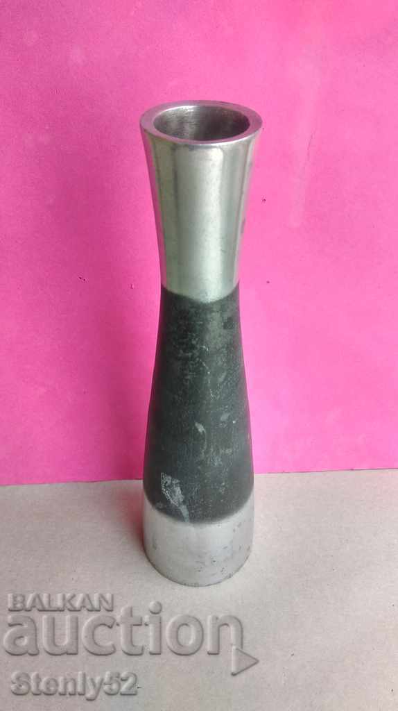 Flower vase, made of stainless steel.