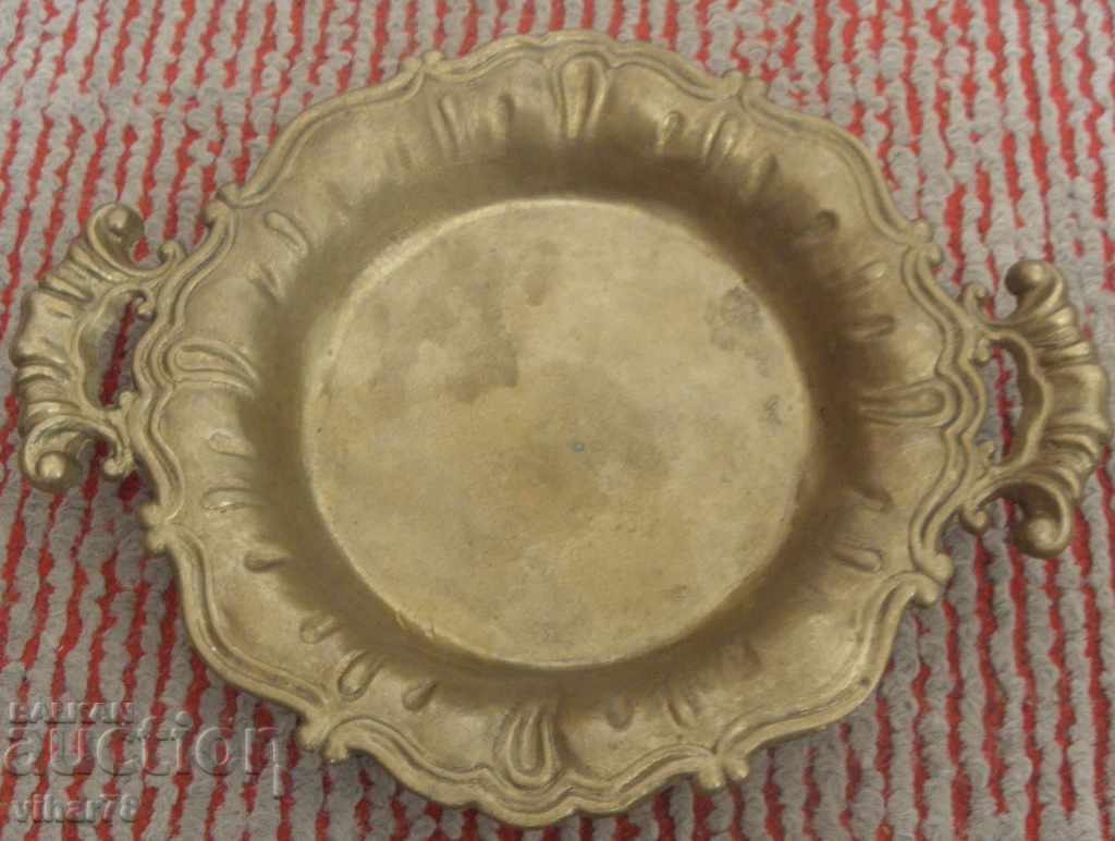 a small old brass tray