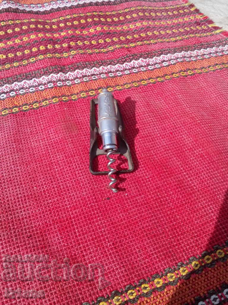 An old bottle opener with price 15.00 BGN | € 7.67