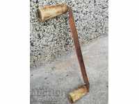 Old rusty wrought iron tool