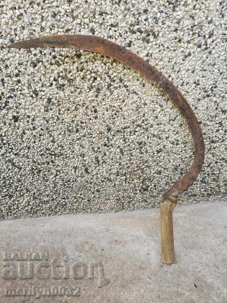 Old sickle, blade, wrought iron