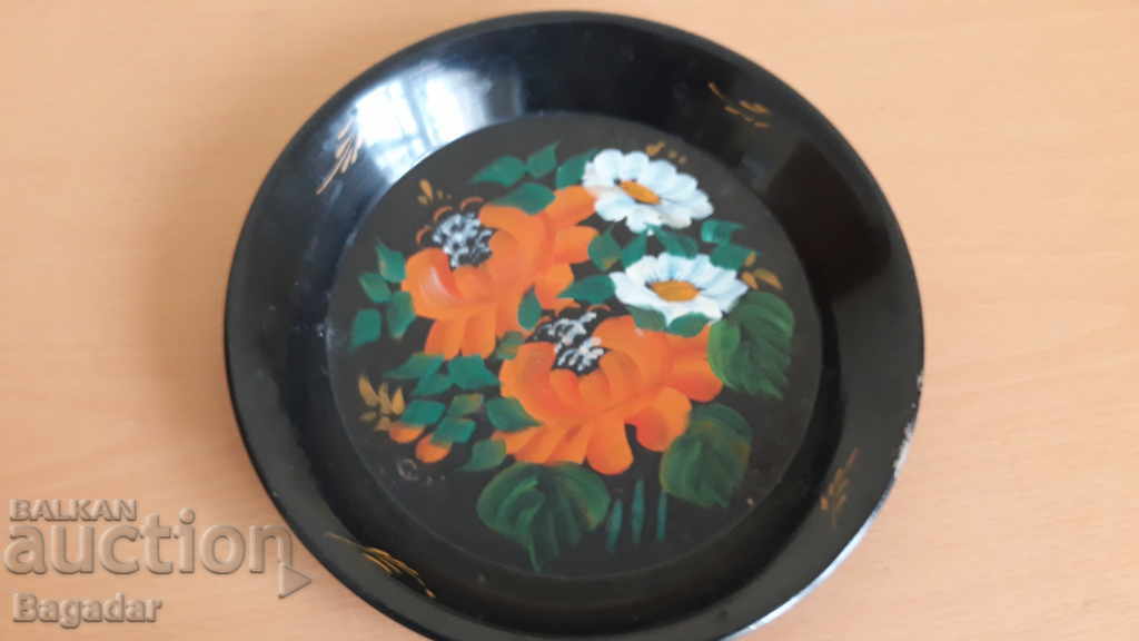 An old hand-painted plate