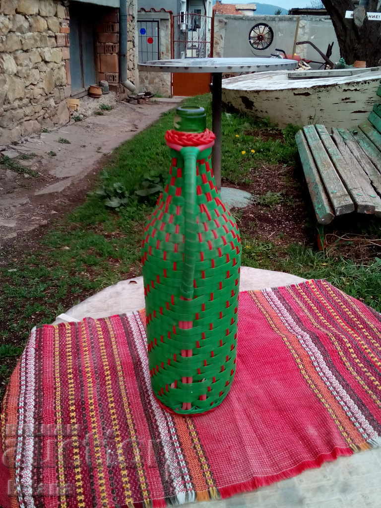 Delivery of Old woven demijohn Delivery of Old woven demijohn