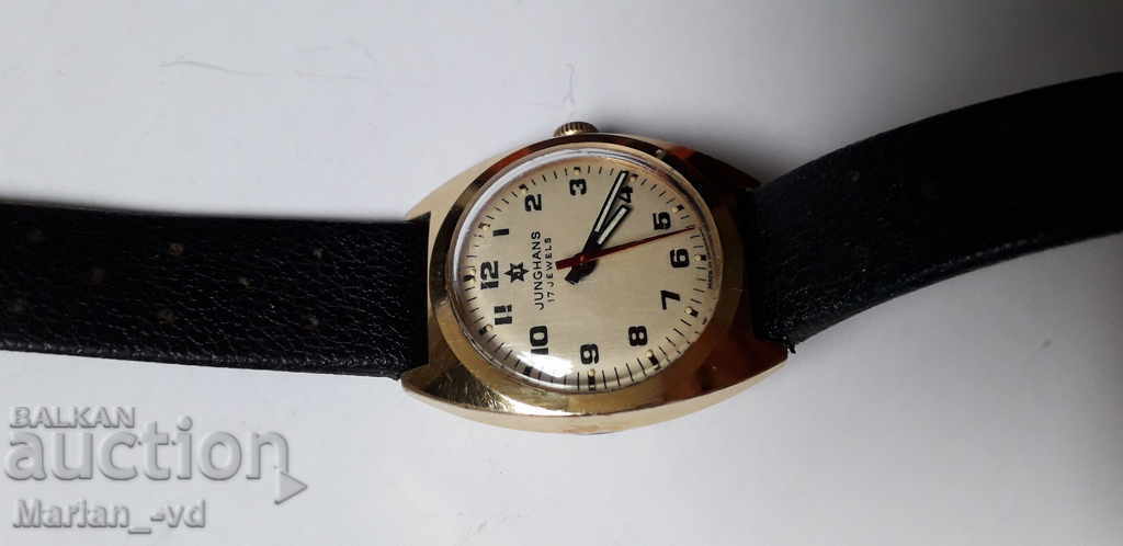 Auction Mechanical gold plated Junghans clock Auction Mechanical gold plated Junghans clock