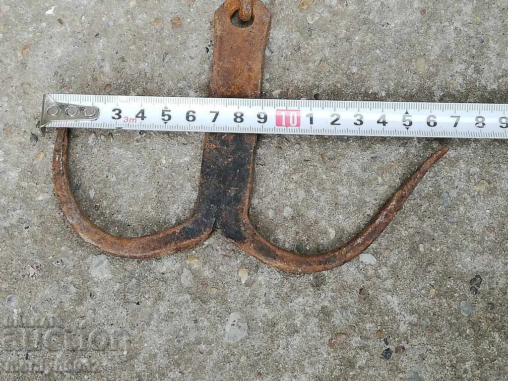 Delivery of An old forged scraping hook, double twin Delivery of An old forged scraping hook, double twin