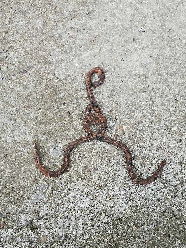 An old forged scraping hook, double twin