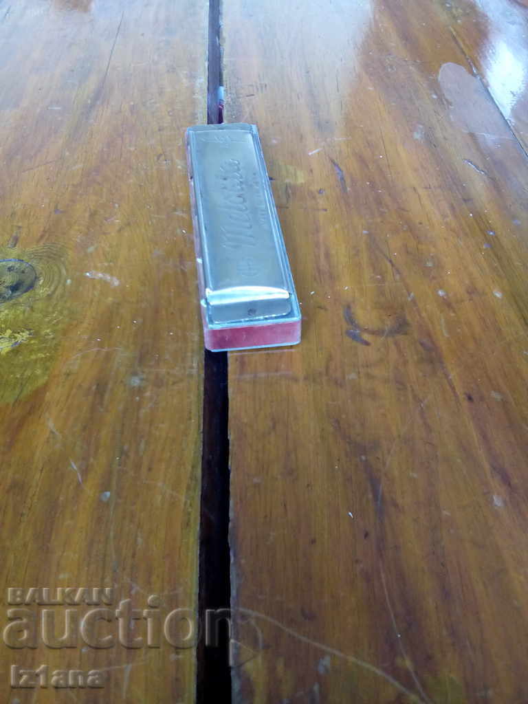 Auction Old harmonica Melodia Auction Old harmonica Melodia