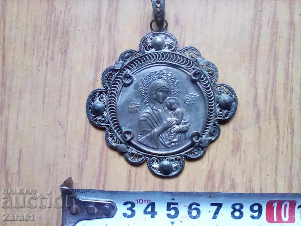 An old religious medallion with price 80.00 BGN | € 40.90 An old religious medallion with price 80.00 BGN | € 40.90