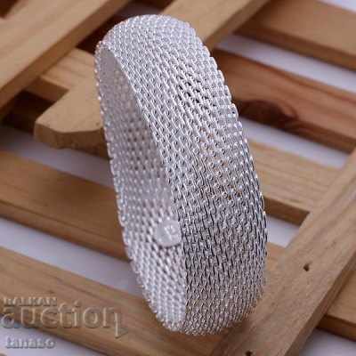 Auction  Massive, knitted lady's mane, silver plated