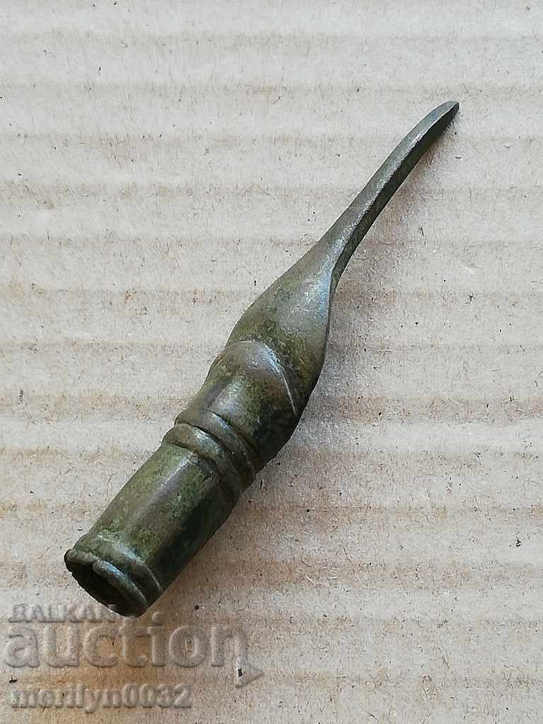 Parts of a flint pistol pistol feather for a bronze scoop