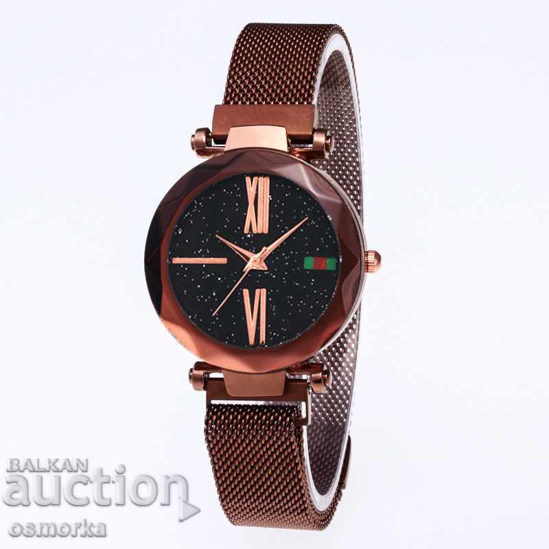 Beautiful ladies watch with metal strap brown strap