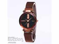 Beautiful ladies watch with metal strap brown strap