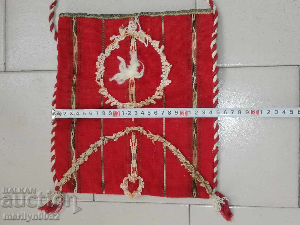 Auction  An old, hand-wraped keldard pouch with a purse