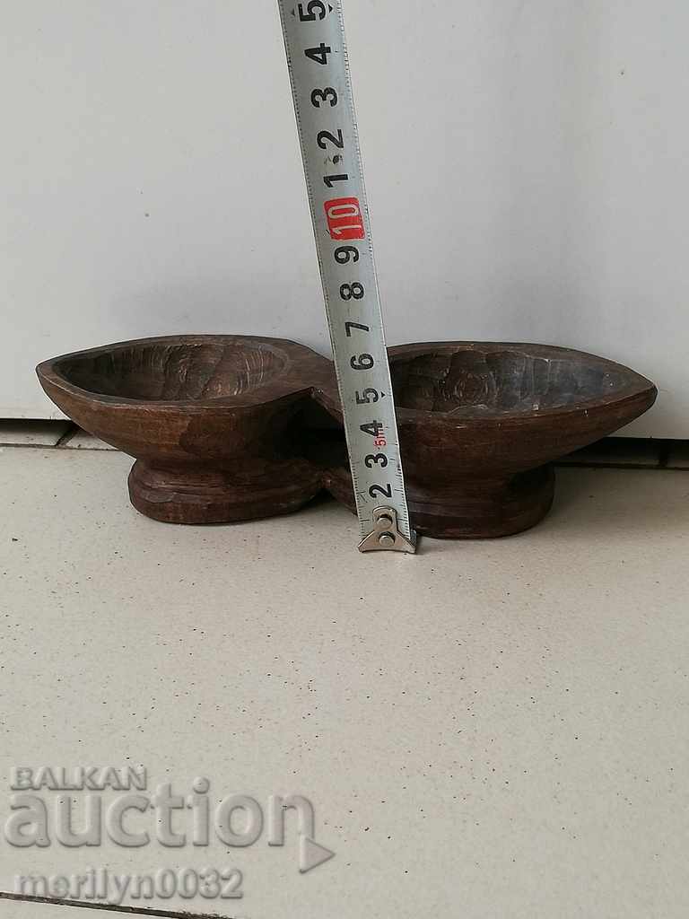 Delivery of An old wooden salon, a salt pan with a spoon, the wooden one Delivery of An old wooden salon, a salt pan with a spoon, the wooden one