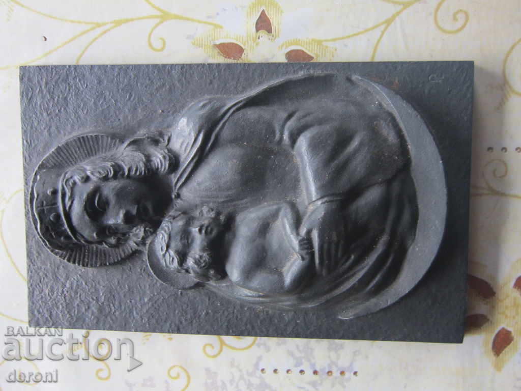 Auction An old author's metallic plastic icon Auction An old author's metallic plastic icon