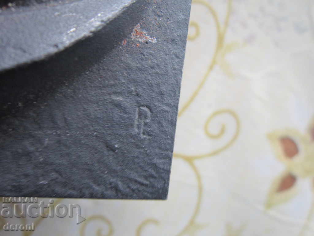 Delivery of An old author's metallic plastic icon Delivery of An old author's metallic plastic icon