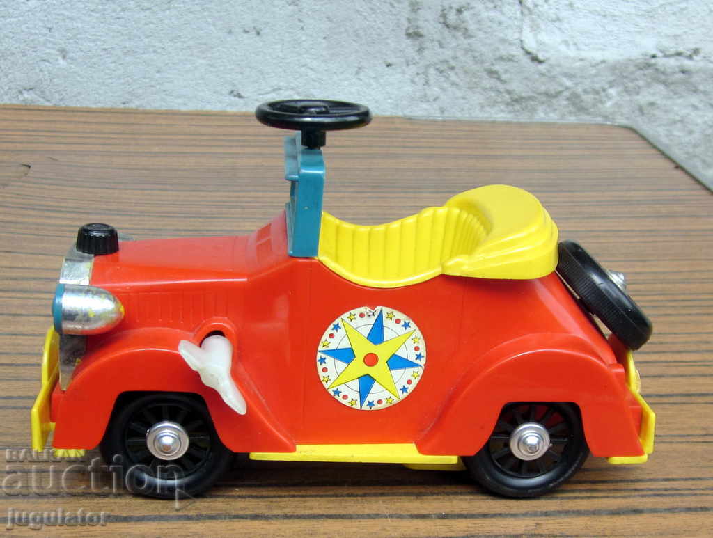 old Spanish mechanical toy wheelchair with FEBER key