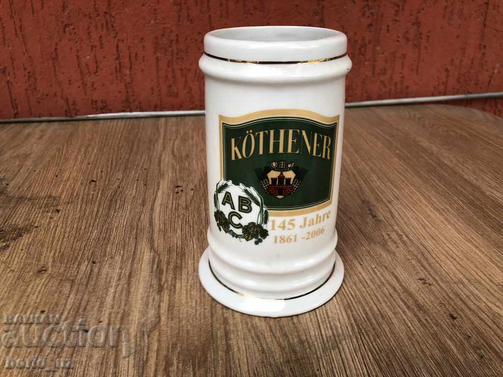9935. porcelain beer mug marked