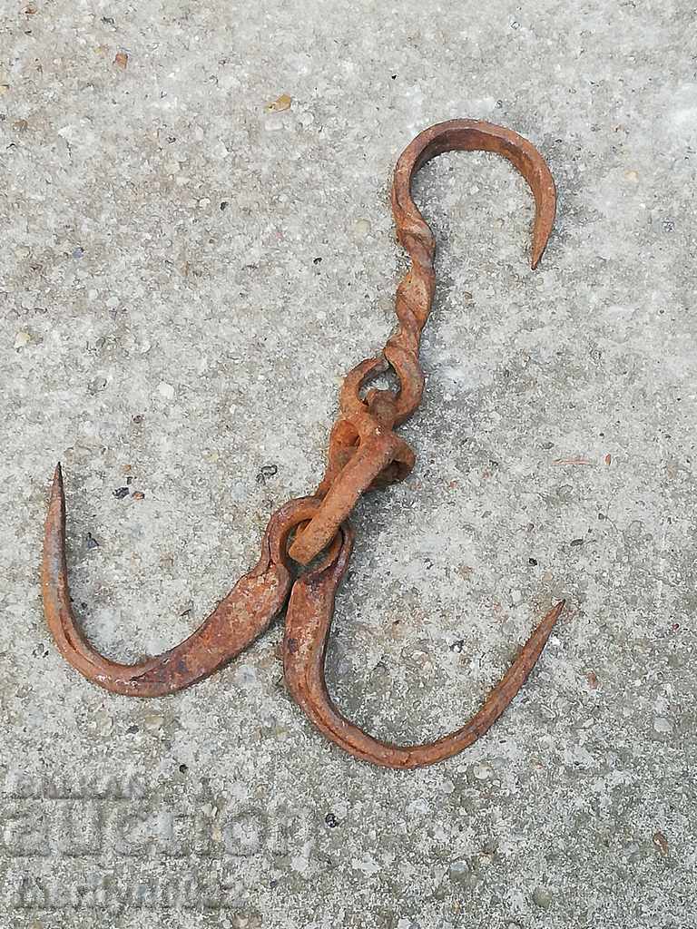 An old forged scraping hook, double twin with price 38.00 BGN | € 19.43 An old forged scraping hook, double twin with price 38.00 BGN | € 19.43