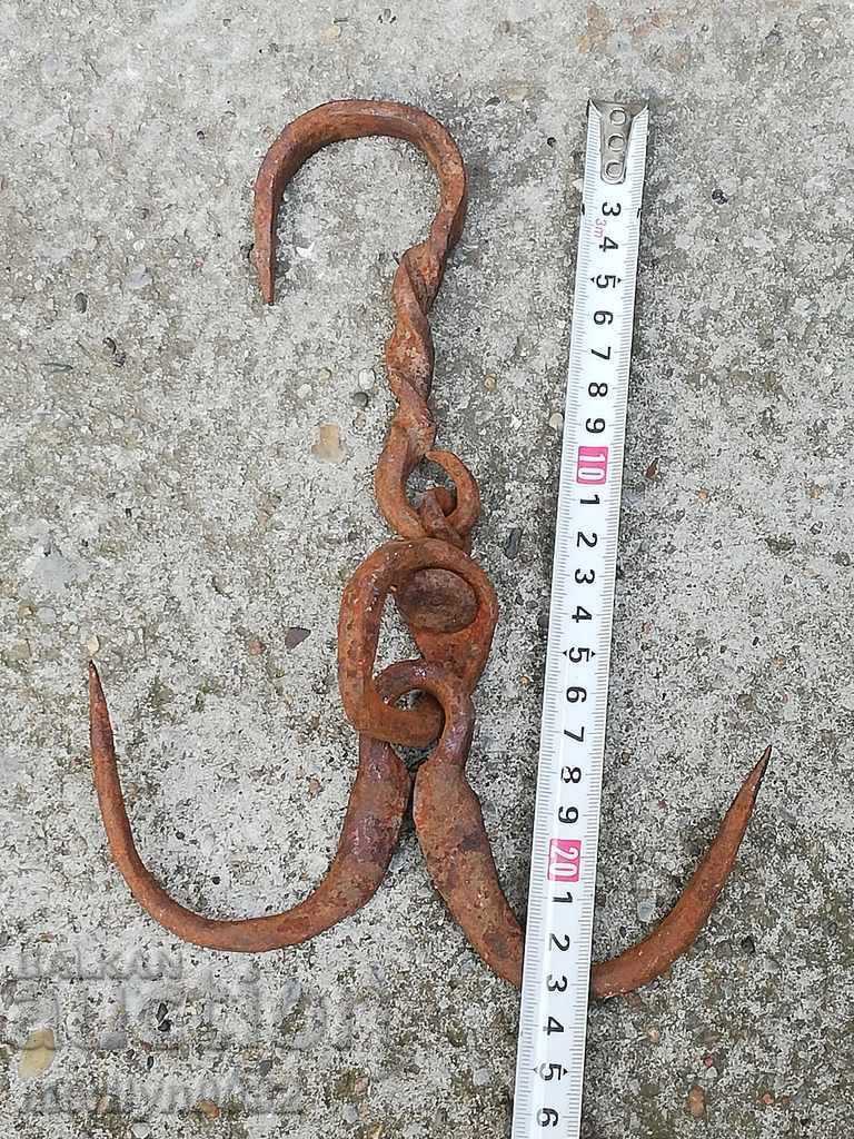 Delivery of An old forged scraping hook, double twin Delivery of An old forged scraping hook, double twin