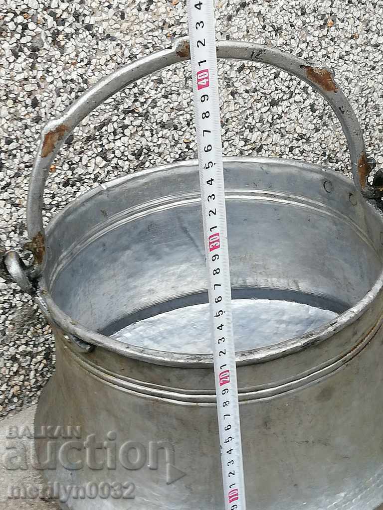 An old copper pot, a tin boiler, a baker, a spoon - 5 An old copper pot, a tin boiler, a baker, a spoon - 5