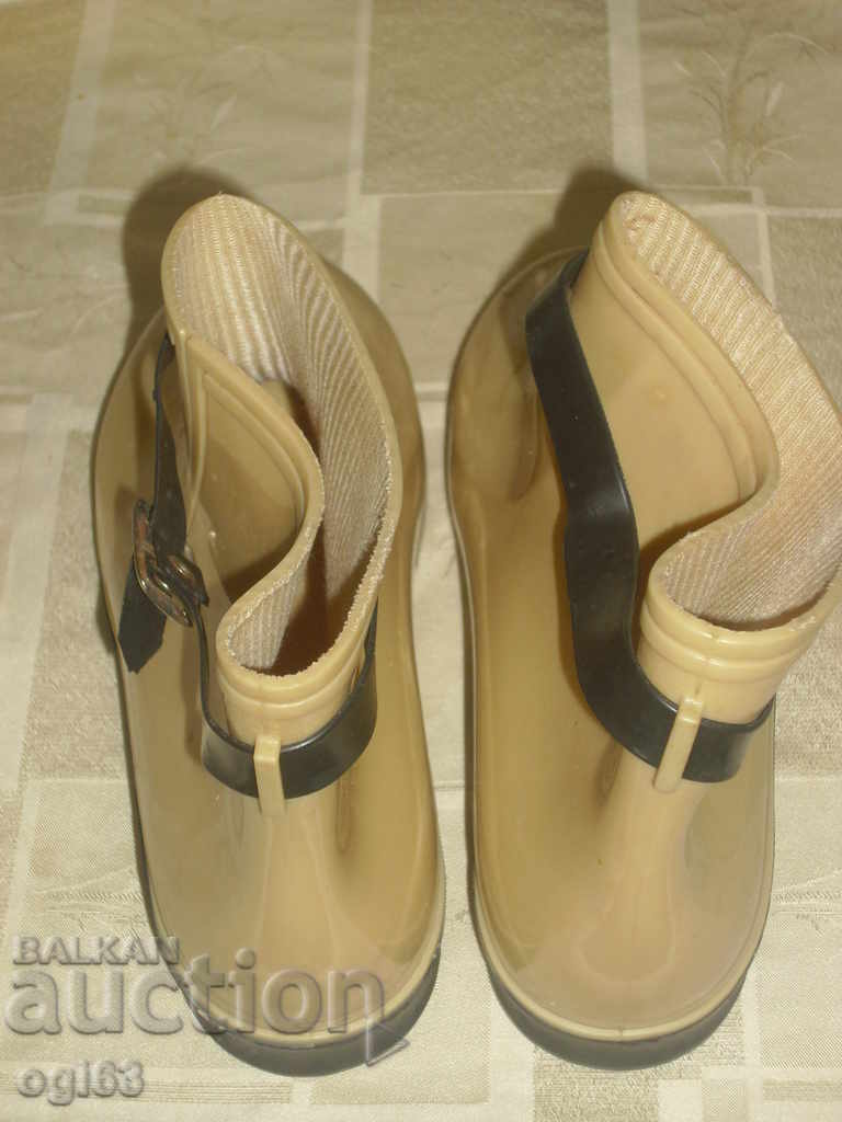 Παράδοση Καουτσούκ μπότες Παράδοση Καουτσούκ μπότες