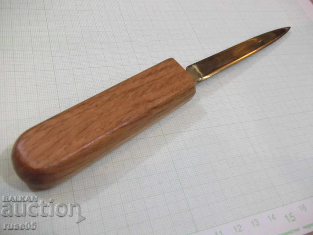 Delivery of Bronze knife with wooden handle for opening letters Delivery of Bronze knife with wooden handle for opening letters