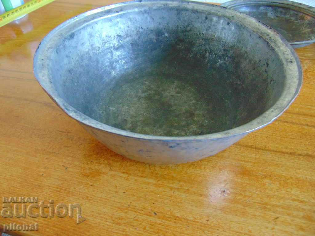 An old copper vessel marked with price 45.00 BGN | € 23.01 An old copper vessel marked with price 45.00 BGN | € 23.01