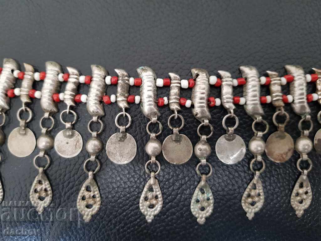 Delivery of A silver Renaissance reading book flaunts a bejeweled costume