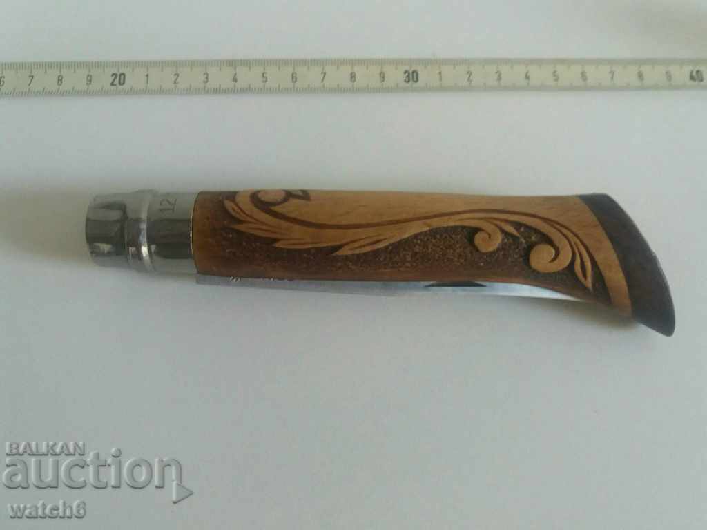 An extremely beautiful Opinel knife with a hand-carved handle - with price 149.99 BGN | € 76.69 An extremely beautiful Opinel knife with a hand-carved handle - with price 149.99 BGN | € 76.69