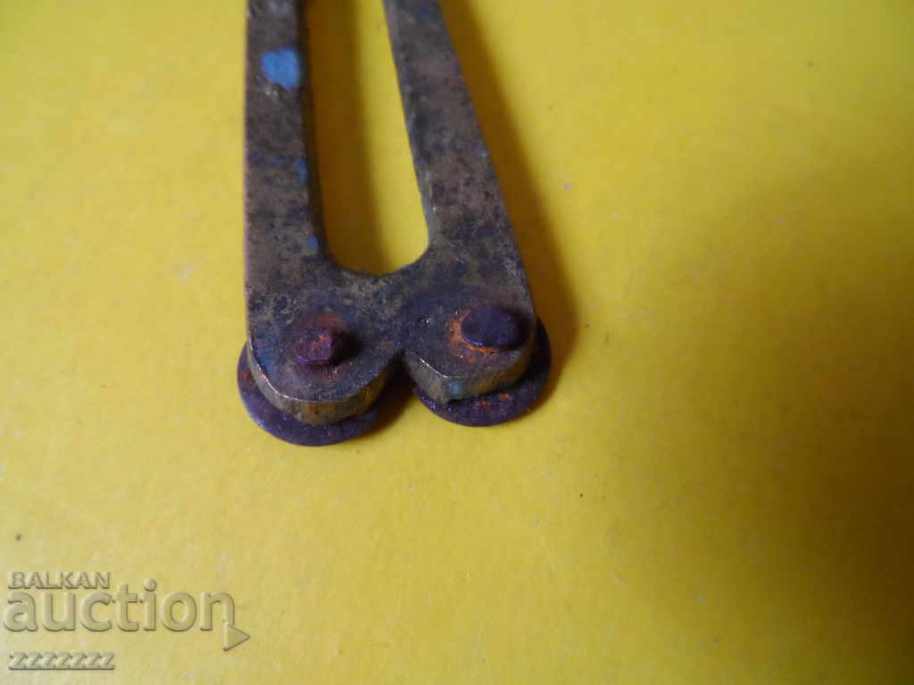 Delivery of old bronze opener/corkscrew