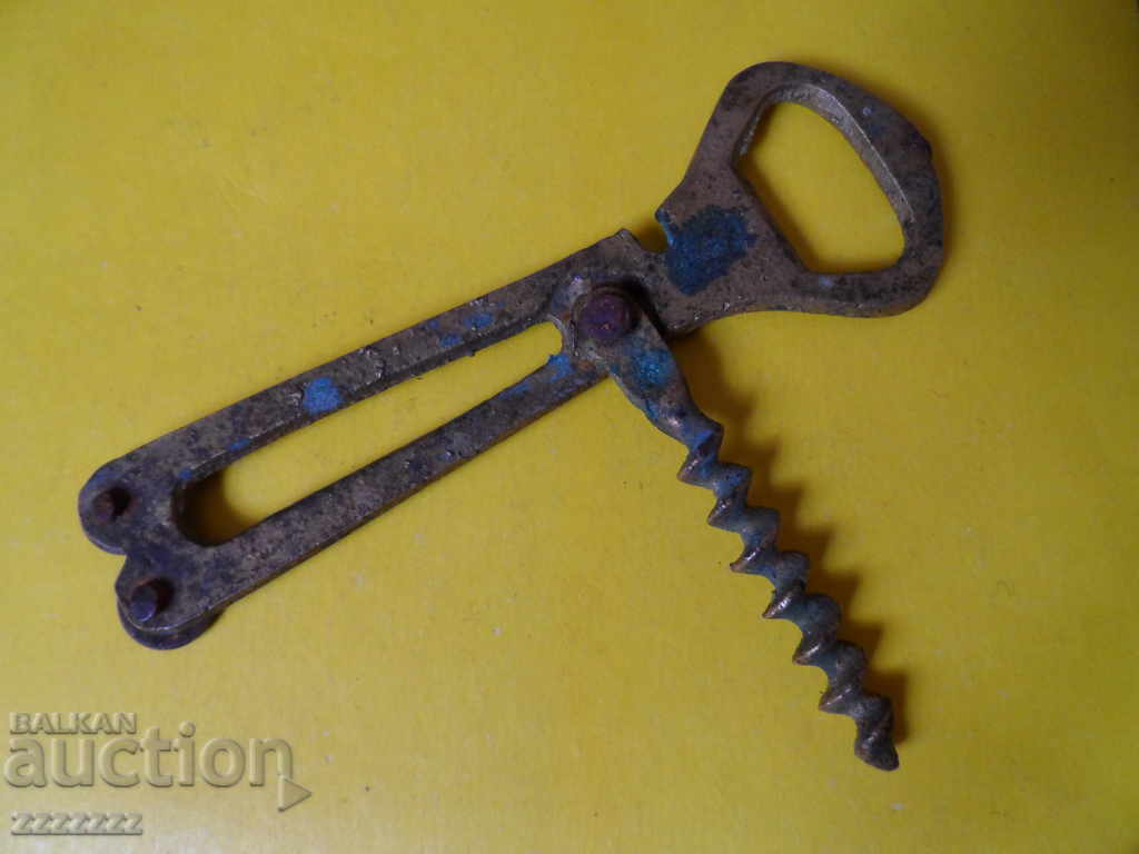 old bronze opener/corkscrew