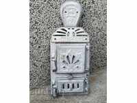 Emblemă și uși de la sobă veche, figură de fontă Dzhamal (Jamal)