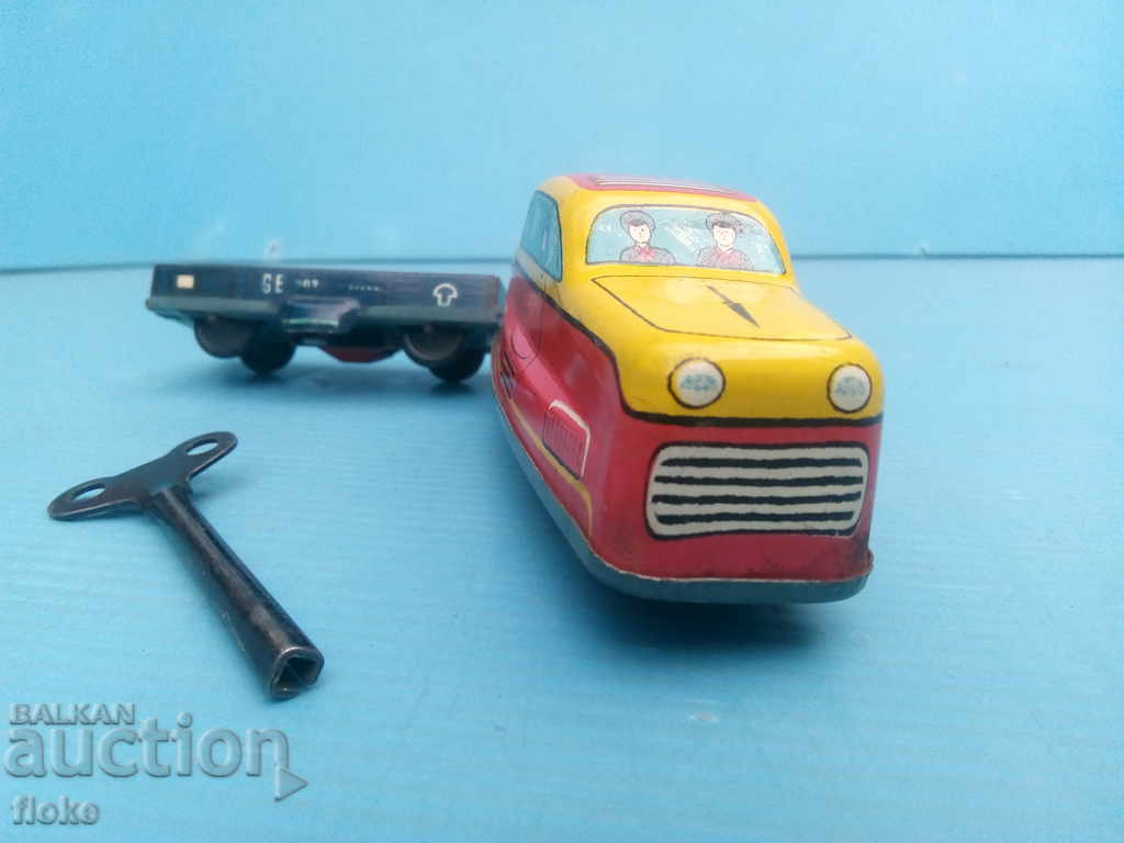 Auction Tin toy-locomotive Auction Tin toy-locomotive