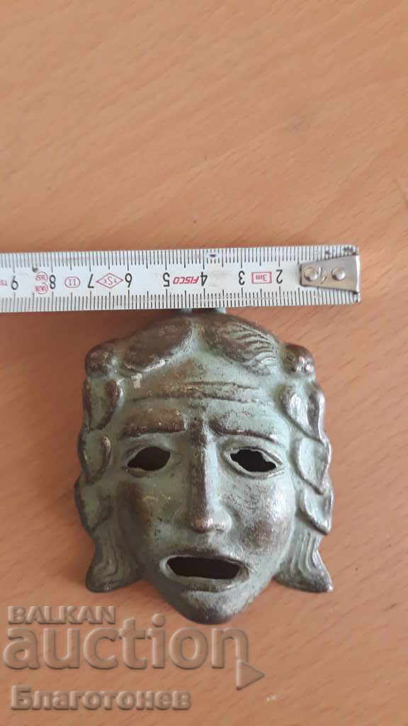Delivery of Old bronze mask Delivery of Old bronze mask