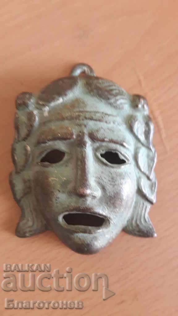 Old bronze mask