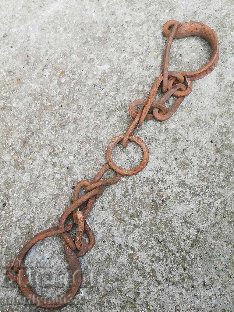 Pair of buckles, shackles, chain, wrought iron Pair of buckles, shackles, chain, wrought iron