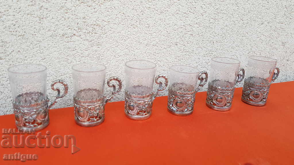 Licitație Suporturi pentru pahare din sticlă WMF 1900-1920 Licitație Suporturi pentru pahare din sticlă WMF 1900-1920