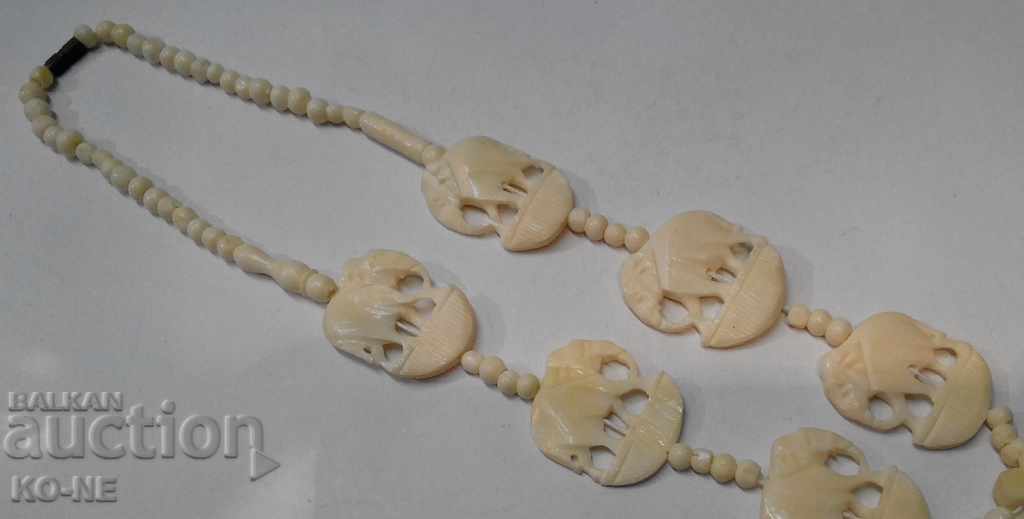 Auction Ivory necklace Auction Ivory necklace